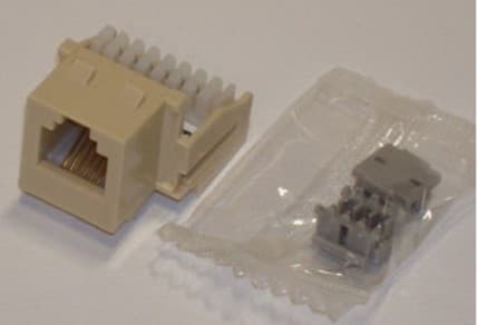Premier PT-KJKU-52 - Jack Module Usoc Rj11insert 6 Position 6 Conductor In Electric Ivory.   The Jack Module Usoc Insert Will Snap Into Keystone Style Faceplates And Housings.